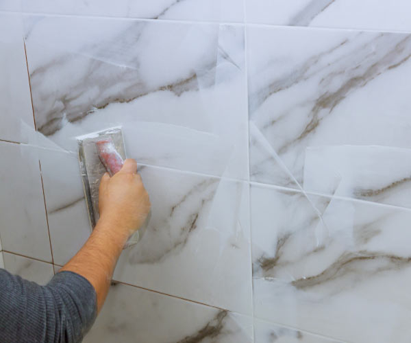 Premium grout sealing service protecting tile grout from stains